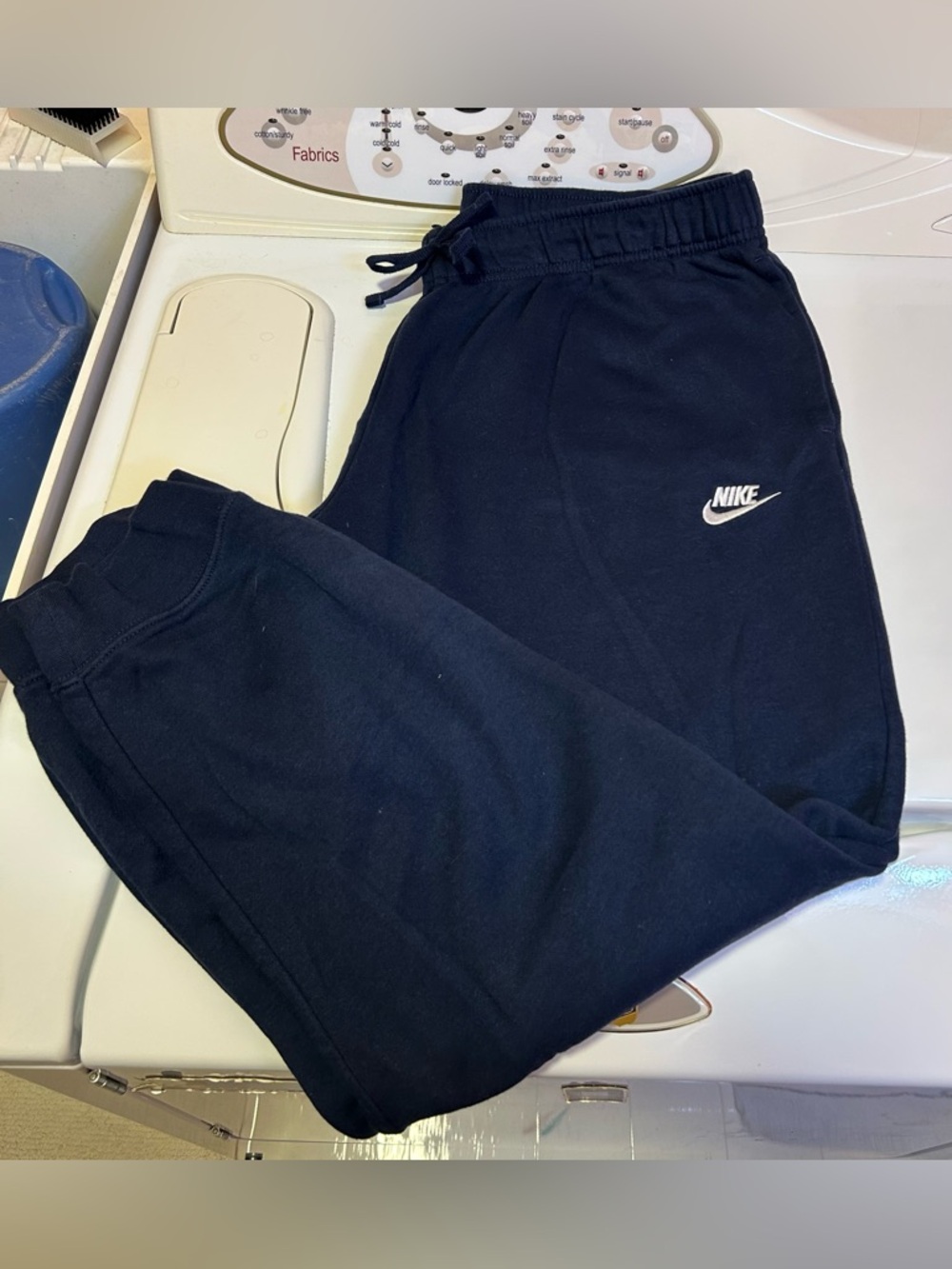 Nike Sportswear Club Fleece joggers in a navy blue colorway.